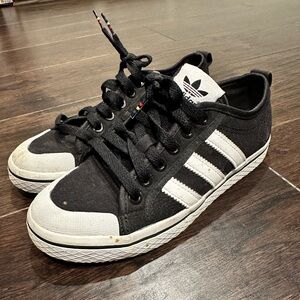 Black and white Adidas sneakers